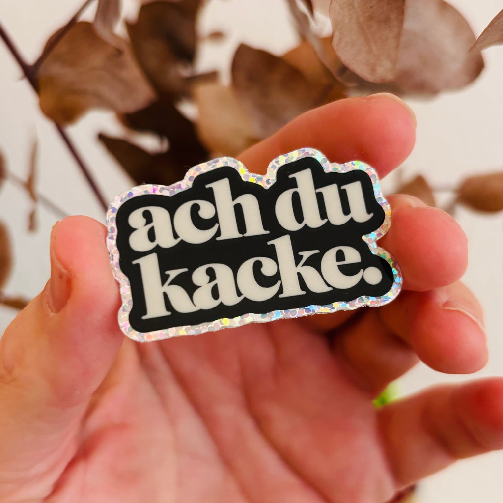 ach du Kacke. Glitzersticker – wasserfester Vinyl-Aufkleber für Laptop & Flasche