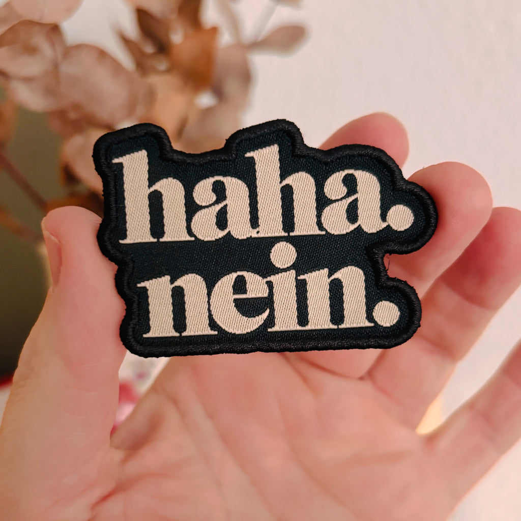 haha. nein. – Gewebter Aufnäher zum Aufbügeln oder Aufnähen