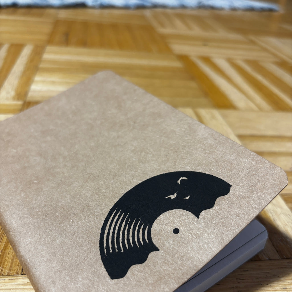 Notizbuch A6 „Vinyl Sun“ | Handbedruckt & Recycelt | Liniert