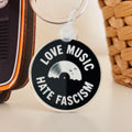 Schlüsselanhänger „Love Music – Hate Fascism“ Schallplatte aus Acryl